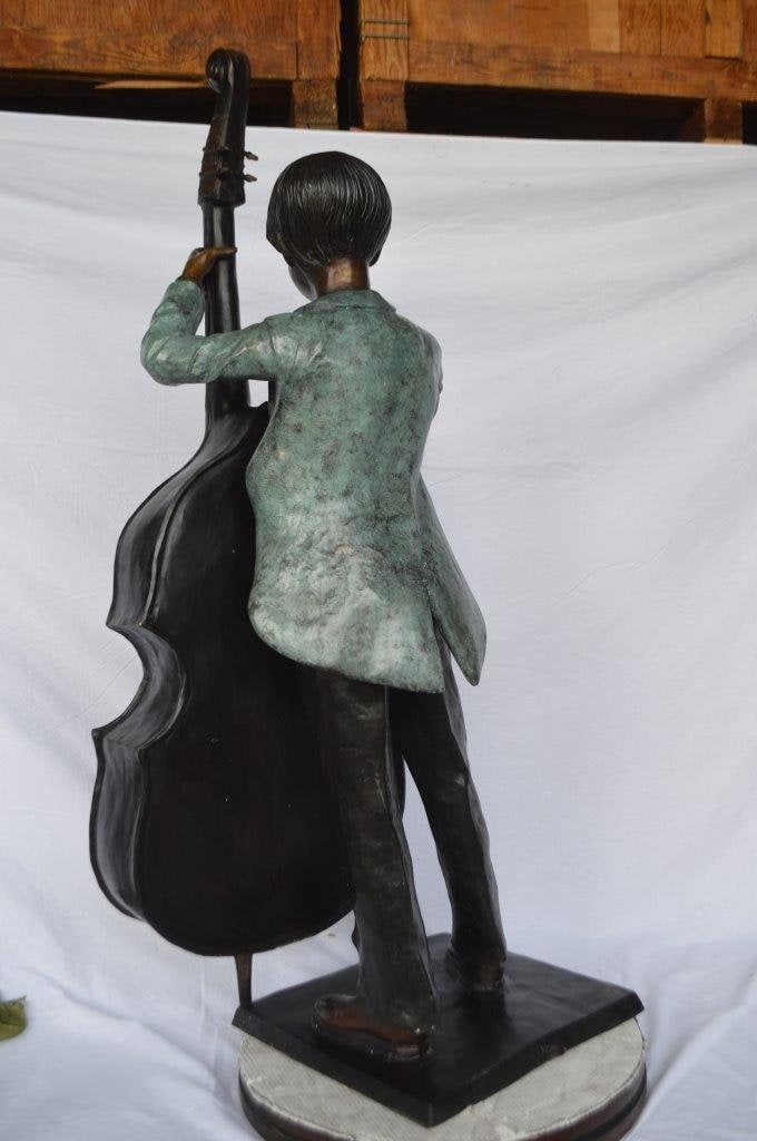 Boy playing cello large bronze statue - Size: 19"L x 22"W x 59"H. - 9