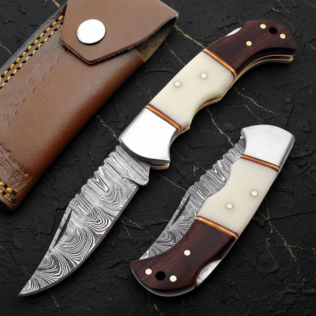Hand Forged Damascus Steel Pocket Knife with White Bone Handle and Brass Filework: Title:Hand Forged Damascus Steel Pocket Knife with White Bone Handle and Brass Filework Description:Discover this beautifully crafted handmade folding knife, a perfect addition for collectors and outd