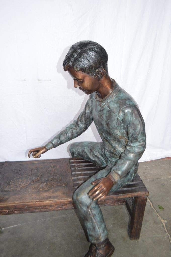 Young Couple Reviewing a World Map Bronze Statue - Size: 32"L x 47"W x 42"H. - 6
