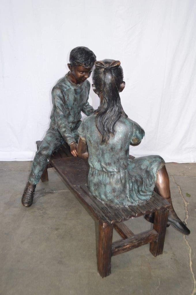 Young Couple Reviewing a World Map Bronze Statue - Size: 32"L x 47"W x 42"H. - 9