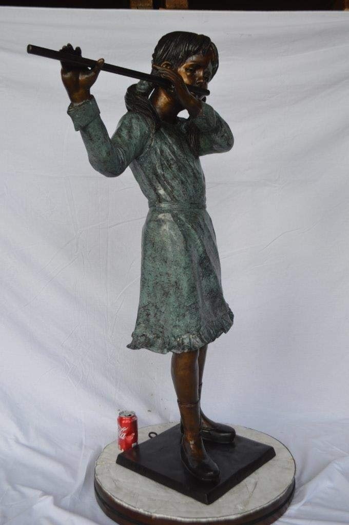 Girl playing flute large bronze statue - Size: 30"L x 15"W x 50"H. - 5