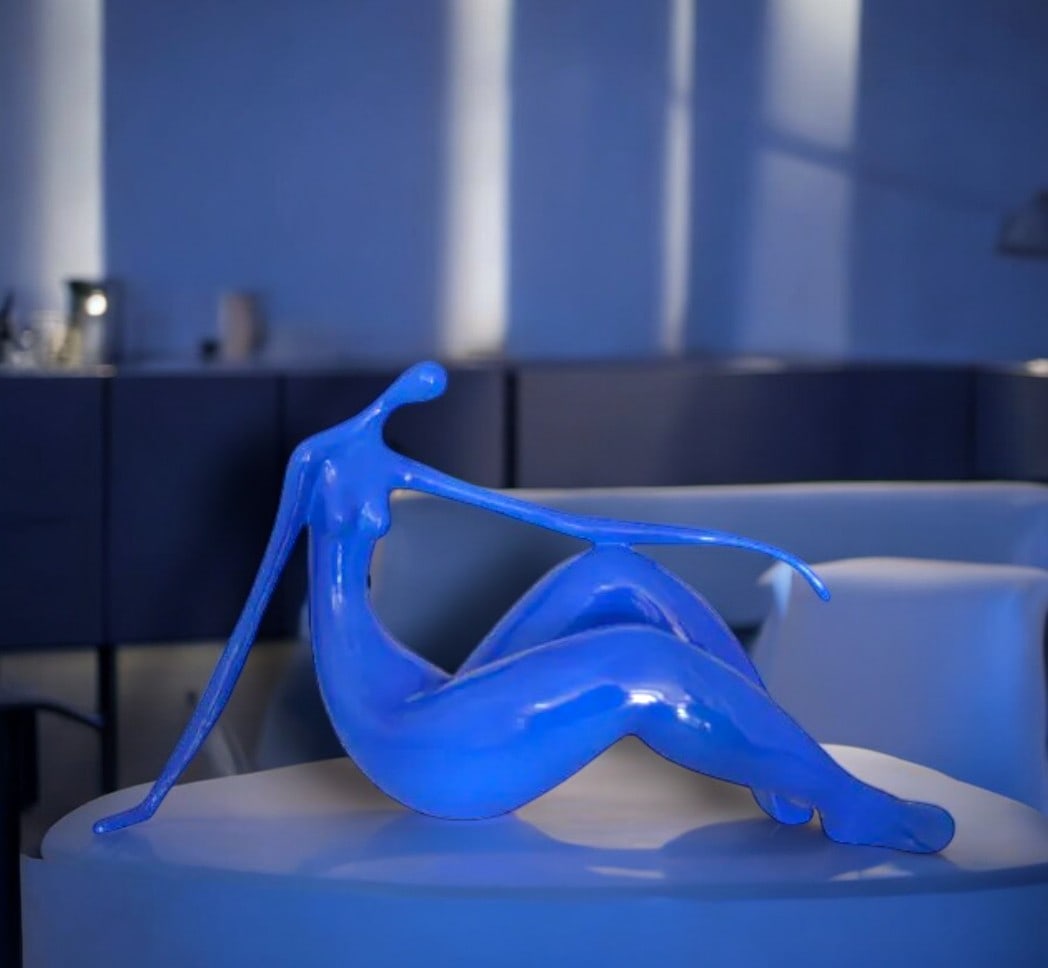 Modern Art Blue Women on the Beach Resin Statue - Size: 27"L x 8"W x 15"H. - 3