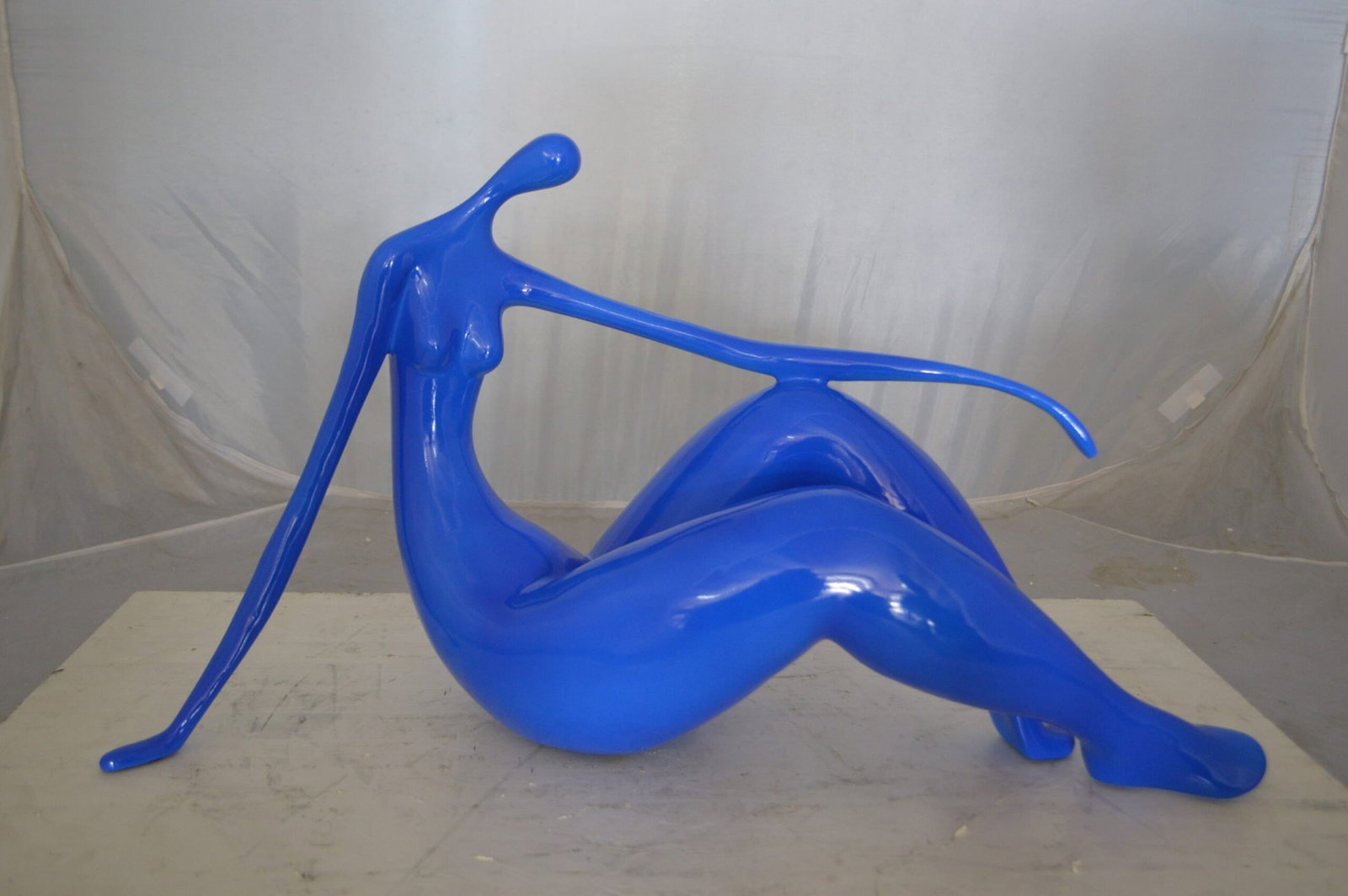 Modern Art Blue Women on the Beach Resin Statue - Size: 27"L x 8"W x 15"H. - 4