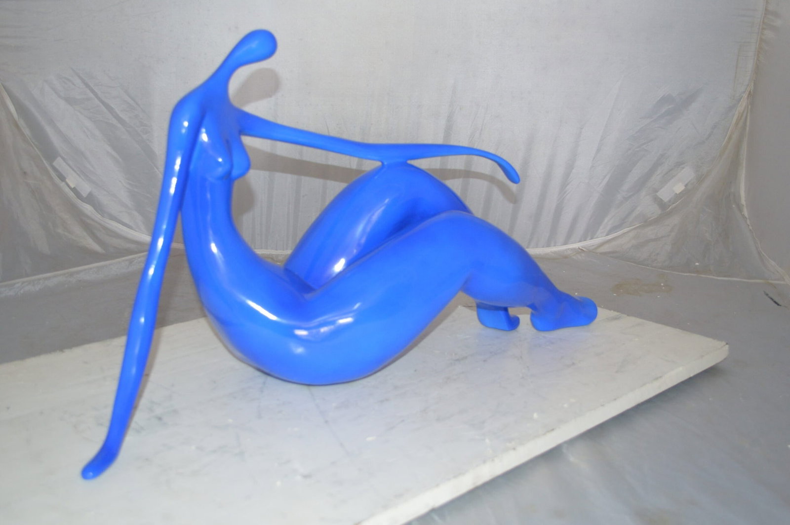Modern Art Blue Women on the Beach Resin Statue - Size: 27"L x 8"W x 15"H. - 5
