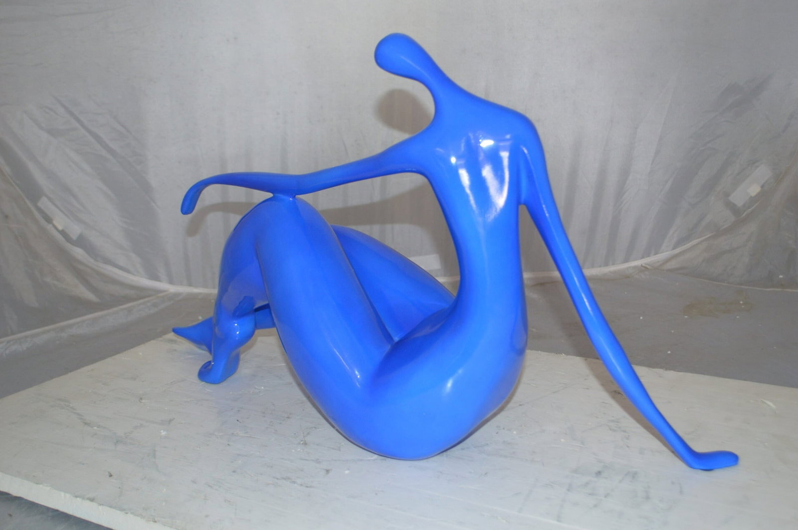Modern Art Blue Women on the Beach Resin Statue - Size: 27"L x 8"W x 15"H. - 8