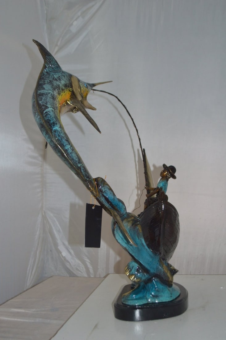 Old Man Fishing a Large Catch Bronze Statue - Size: 27"L x 13"W x 30"H. - 10