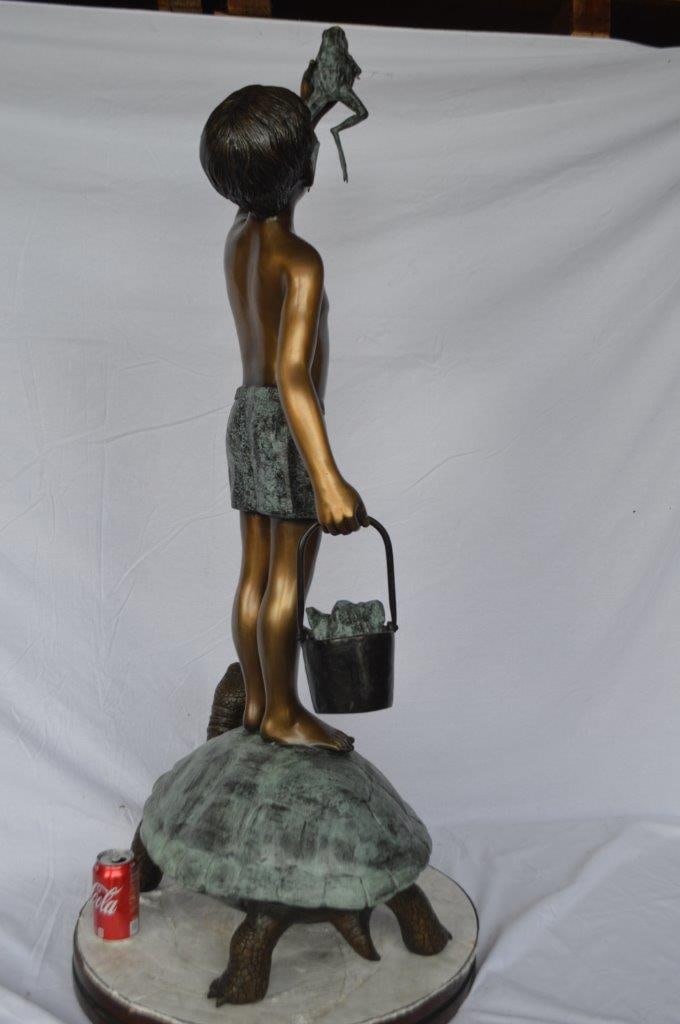 Boy on turtle holding frog bronze fountain statue - Size: 24"L x 18"W x 55"H. - 5