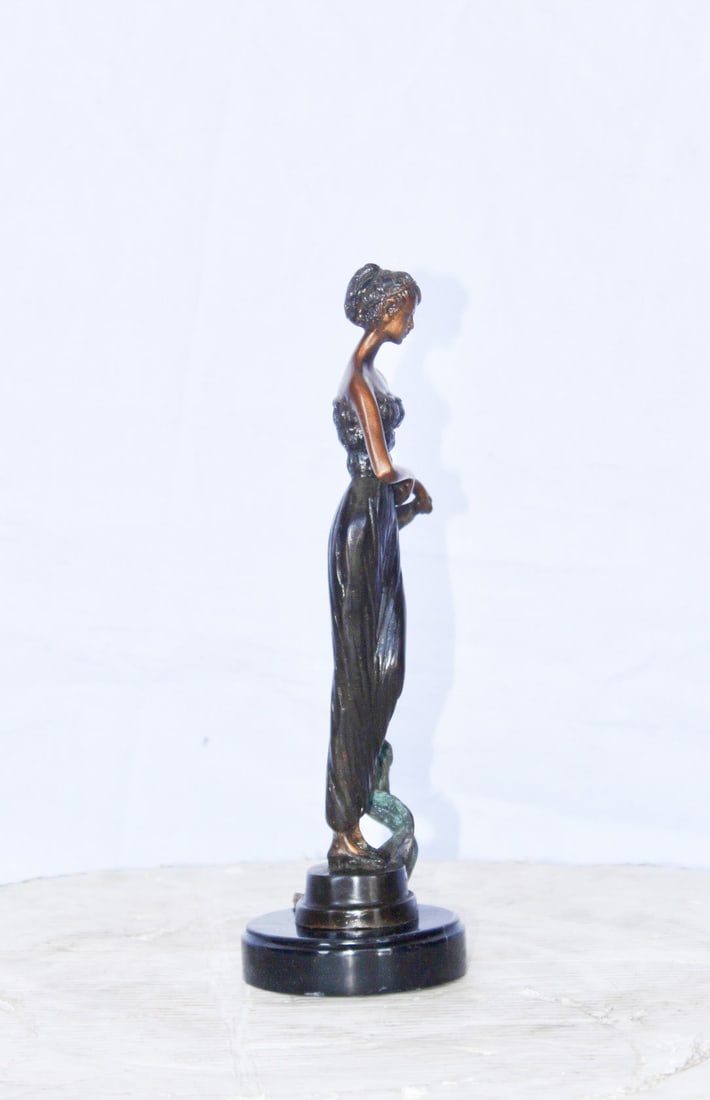Young girl holding a sheer sheet in the wind - Size: 6"L x 4"W x 13"H. - 3
