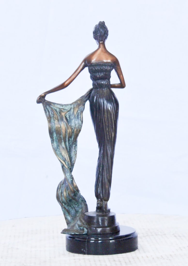Young girl holding a sheer sheet in the wind - Size: 6"L x 4"W x 13"H. - 5