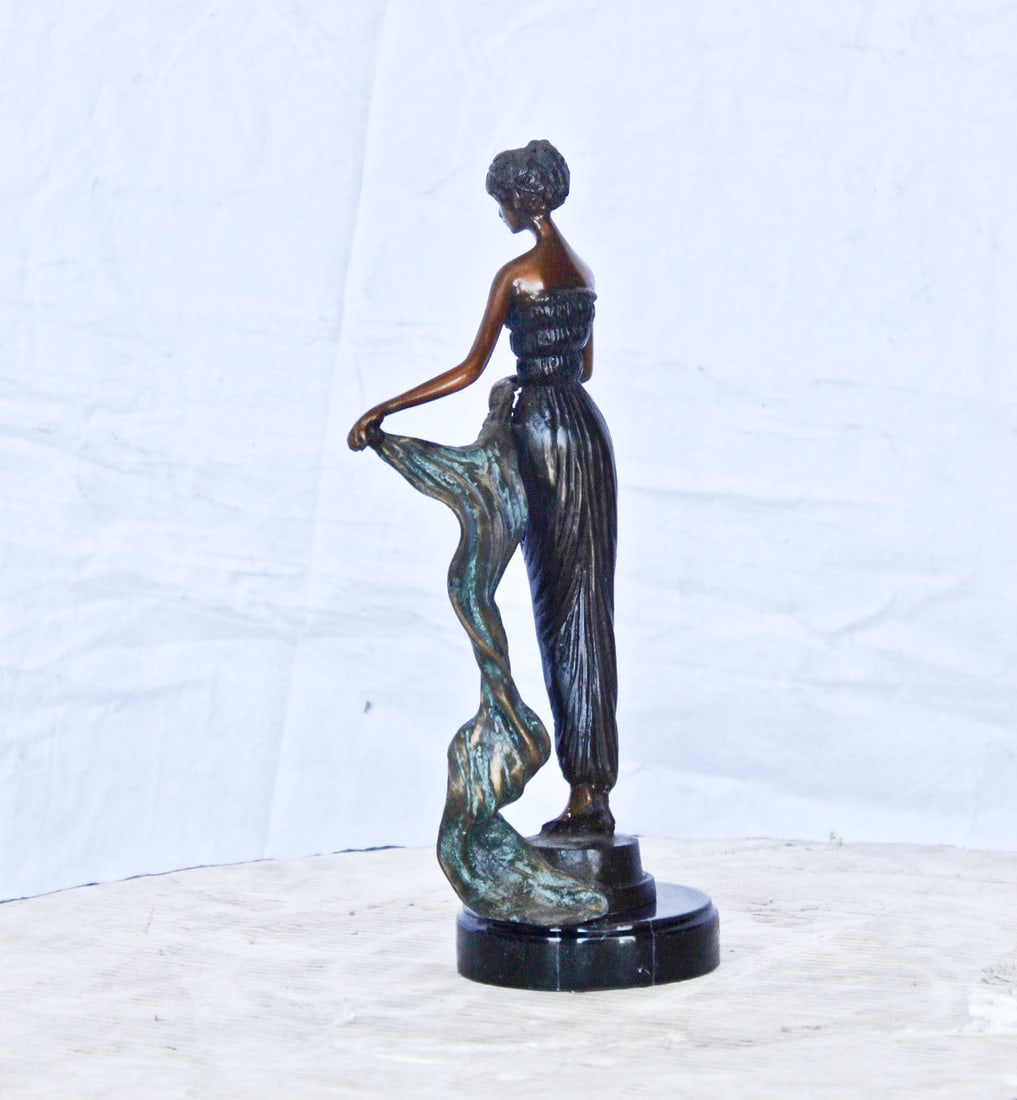 Young girl holding a sheer sheet in the wind - Size: 6"L x 4"W x 13"H. - 6