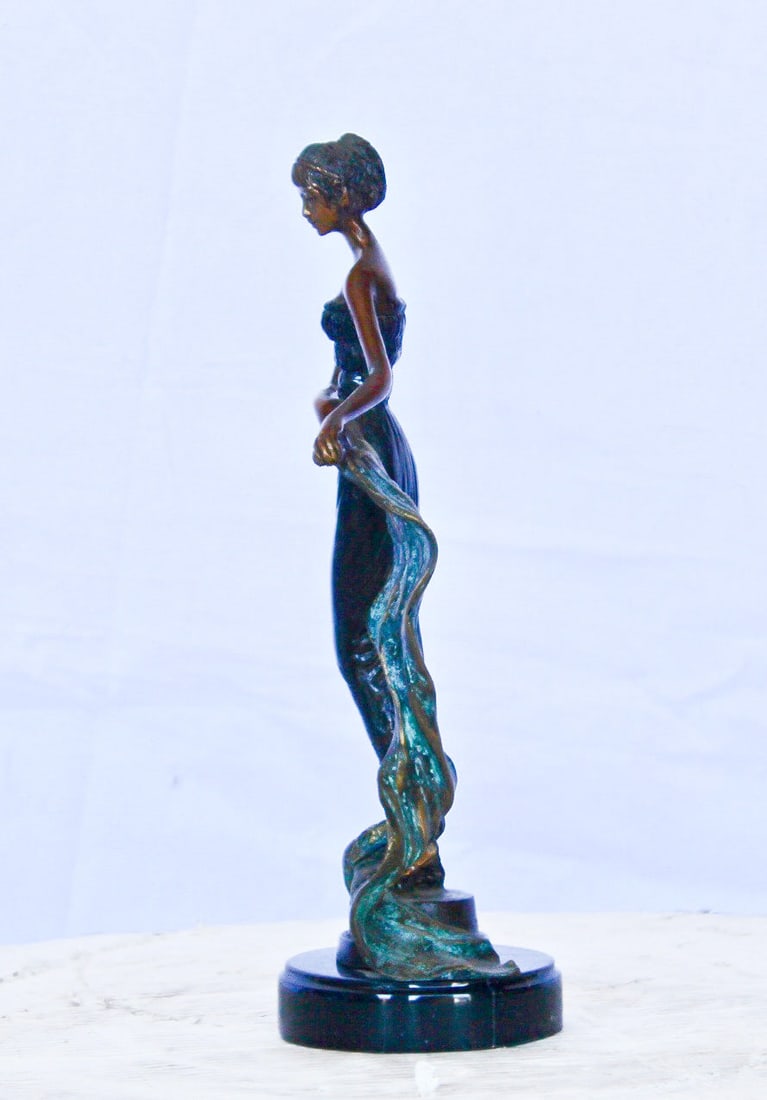 Young girl holding a sheer sheet in the wind - Size: 6"L x 4"W x 13"H. - 7