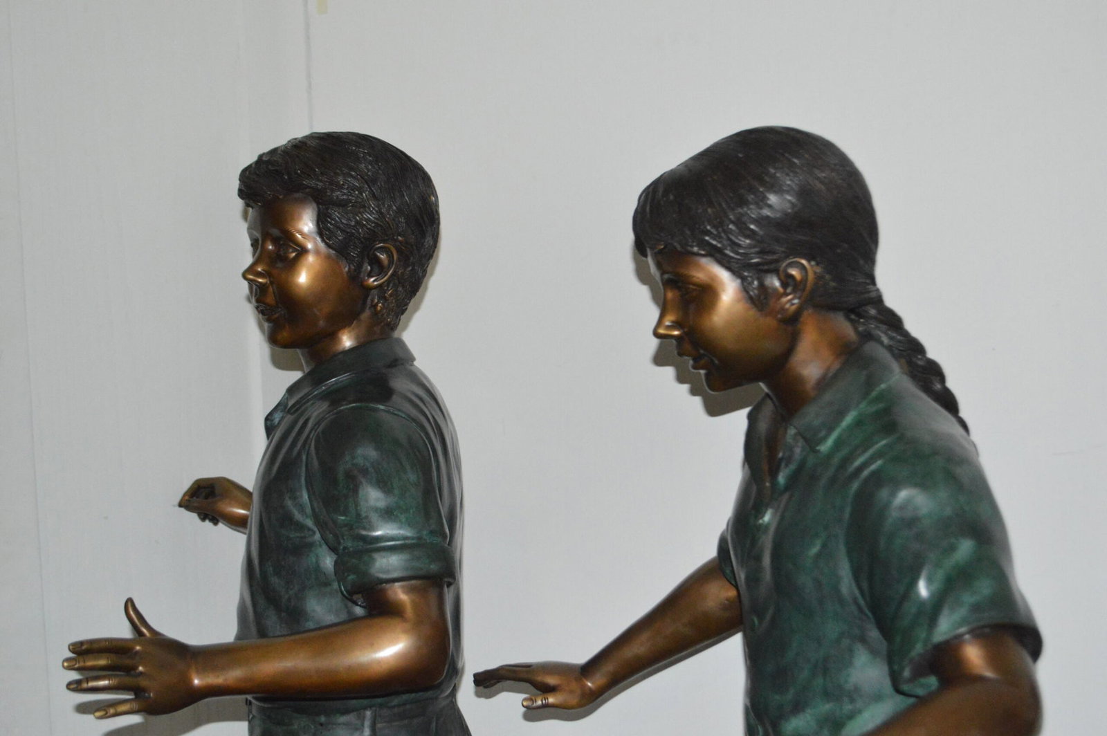 Five Kids Walking on Rocks Bronze Statues - Size: "L x "W x "H. - 10