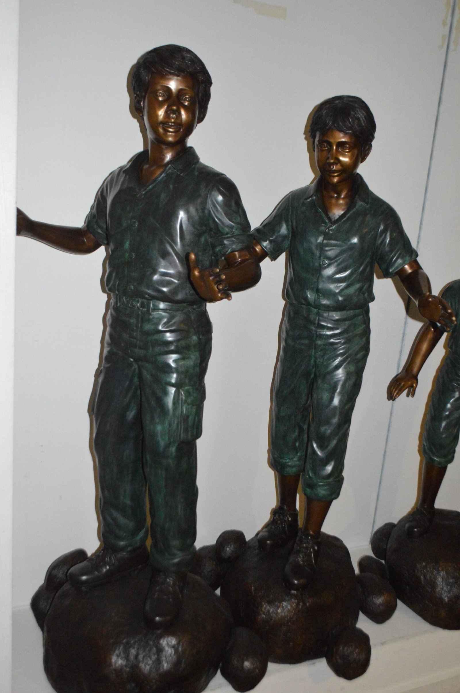 Five Kids Walking on Rocks Bronze Statues - Size: "L x "W x "H. - 3