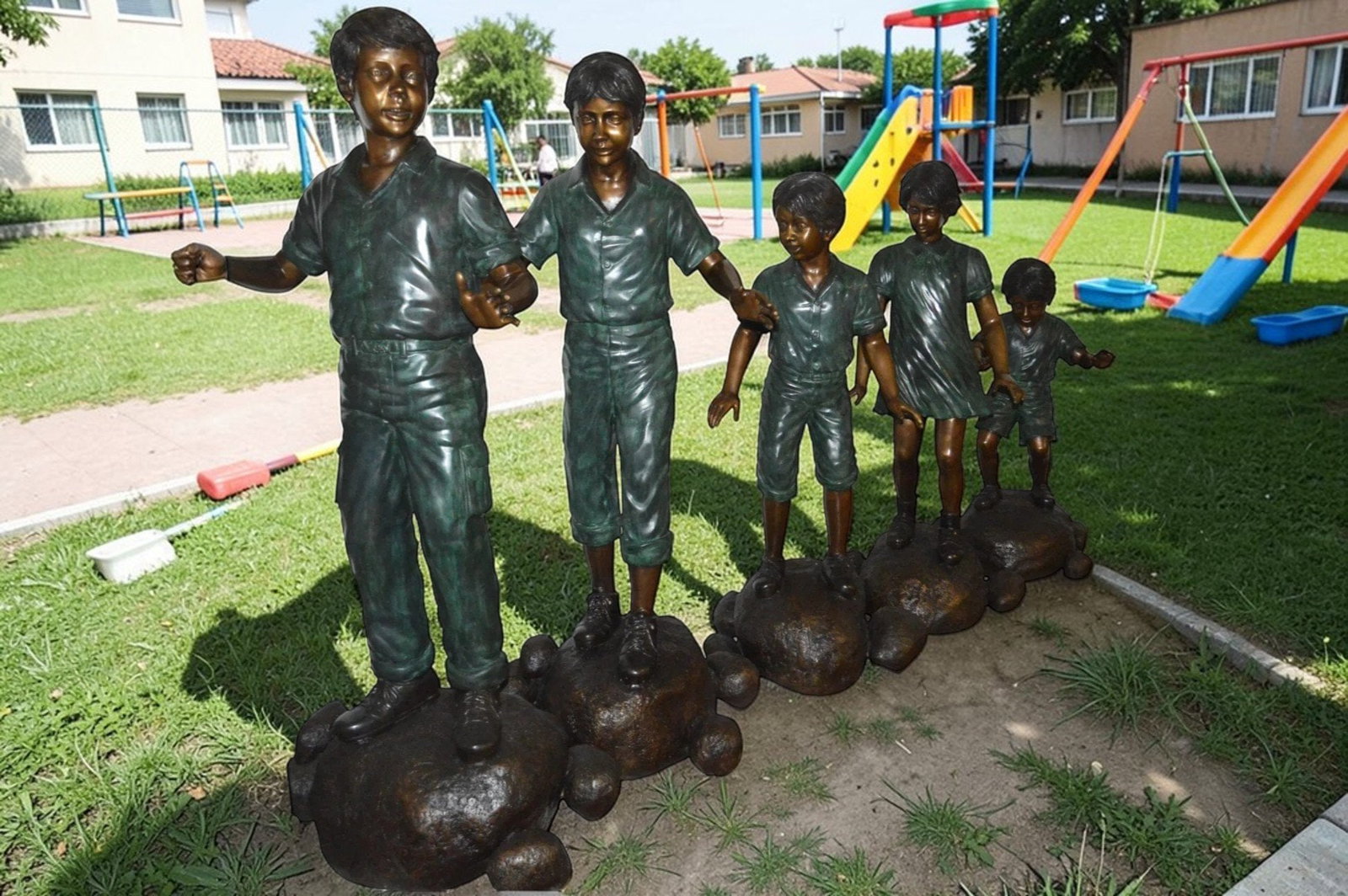 Five Kids Walking on Rocks Bronze Statues - Size: "L x "W x "H. - 4