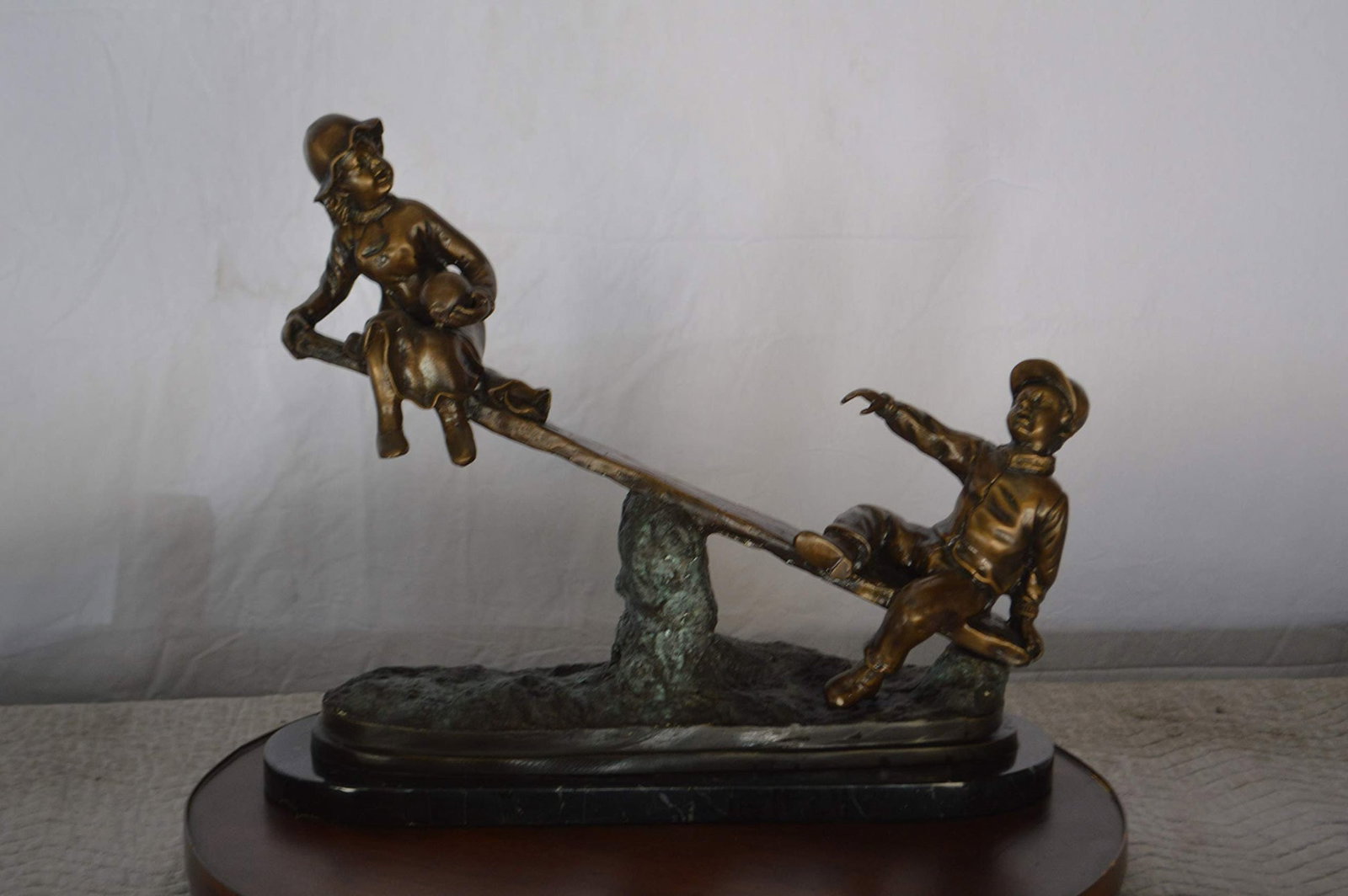 Boys Playing Seesaw on a Marble Base Bronze Statue - Size: 22"L x 8"W x 17"H. - 2