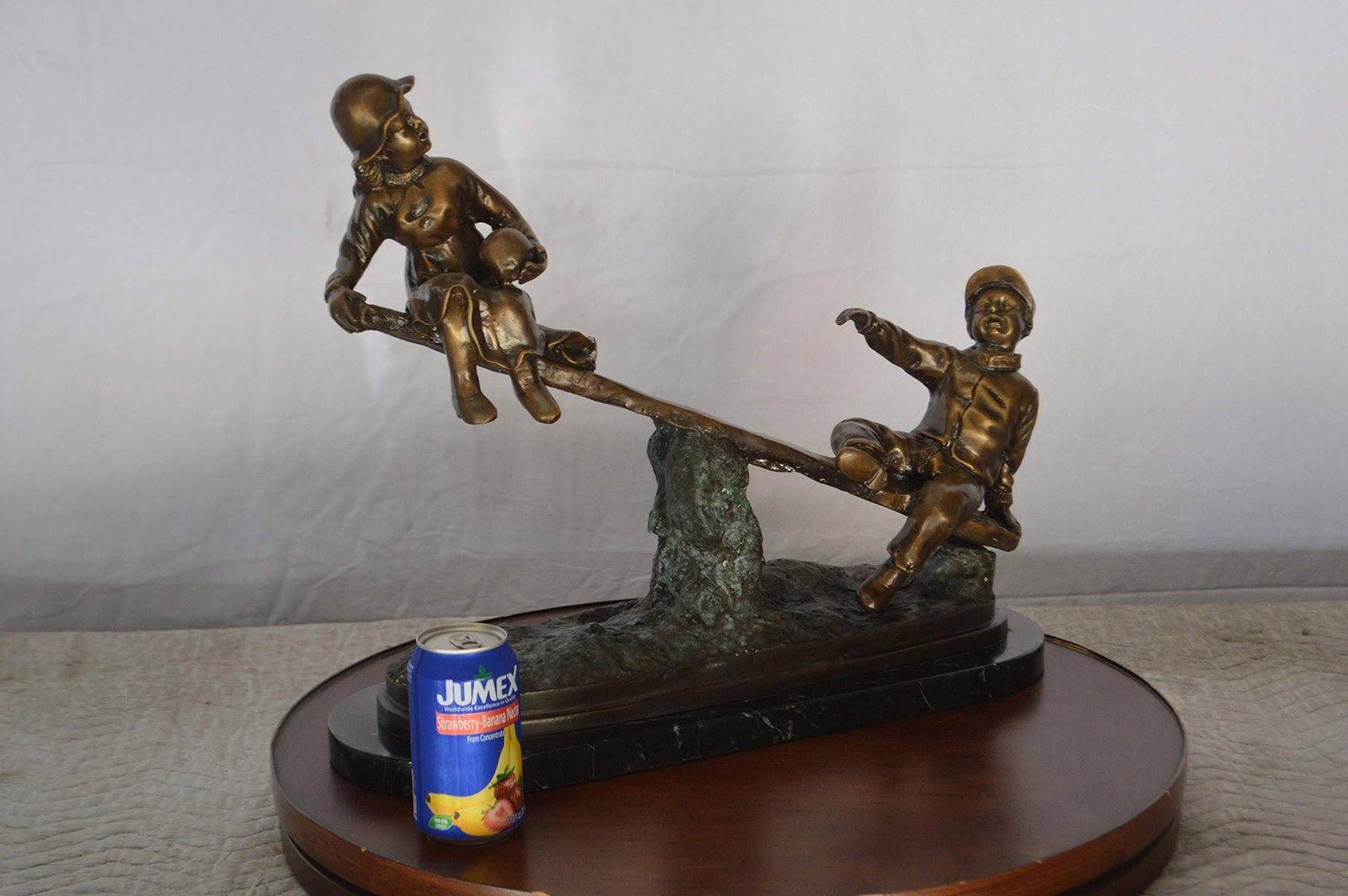 Boys Playing Seesaw on a Marble Base Bronze Statue - Size: 22"L x 8"W x 17"H. - 3