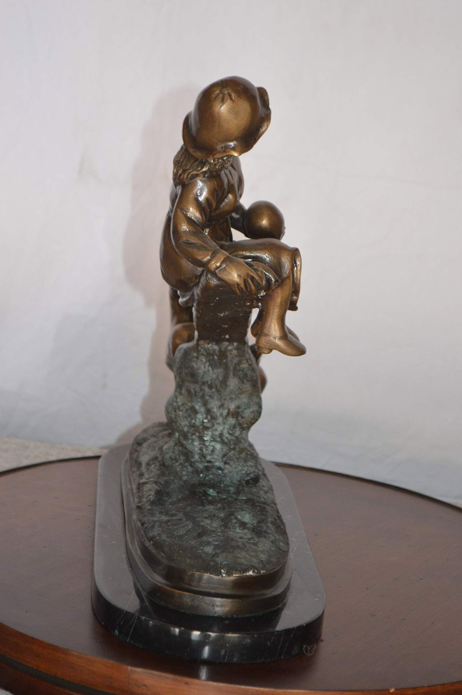 Boys Playing Seesaw on a Marble Base Bronze Statue - Size: 22"L x 8"W x 17"H. - 4