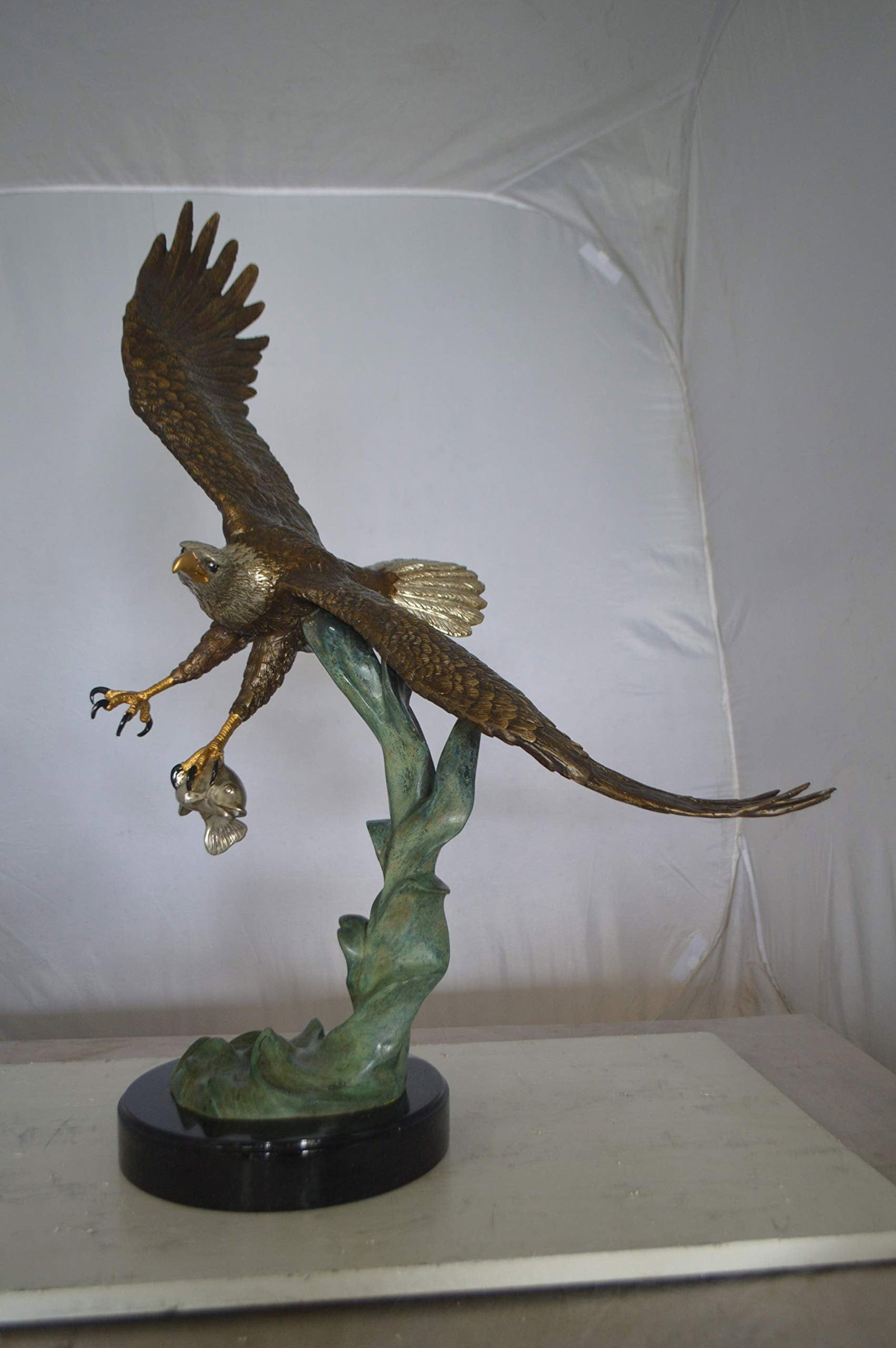 Eagle Flying With His Pray Bronze Statue - Size: 32"L x 15"W x 33"H. - 4