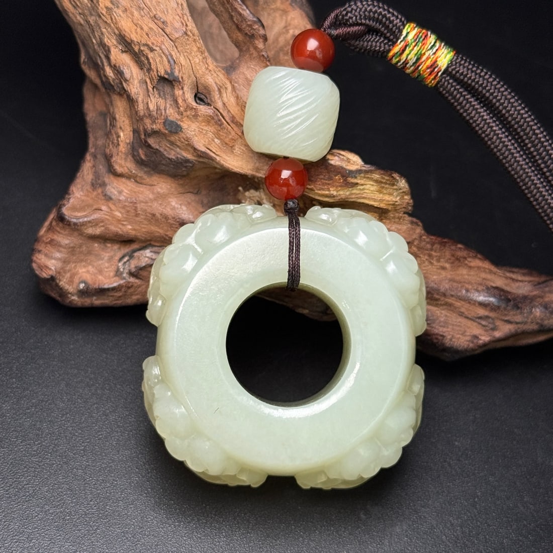 Old Hetian Jade Hand Carved Beast Thumb Ring Pendant: Title: Old Hetian Jade Hand Carved Beast Thumb Ring Pendant Origin: Chinese Date/Period: After1900 Materials: Hetian Jade Dimensions: 52x52x24(mm) 2.05x2.05x0.94(inches) Weight 0.27 lbs/121g Inside Di