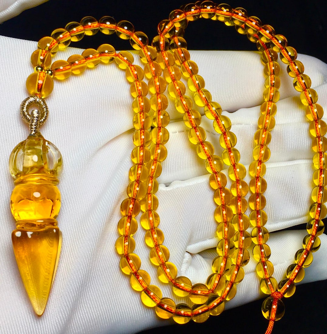 Natural Yellow Crystal Pestle Xiangmo Pendant & Necklace: Title: Natural Yellow Crystal Pestle Xiangmo Pendant & Necklace Origin: Chinese Date/Period: After2025 Materials: Yellow Crystal Dimensions: 40.8x11.6x11.6(mm) 1.61x0.46x0.46(inches) Weight 0.06