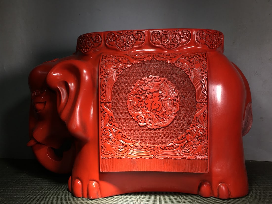 Vintage Red Lacquerware Elephant Statue: Title: Vintage Red Lacquerware Elephant Statue Origin: Chinese Date/Period: After1900 Materials: Red Lacquerware Dimensions: 500x260x340(mm) 19.69x10.24x13.39(inches) Weight 20.41 lbs/9260g Reserve: $