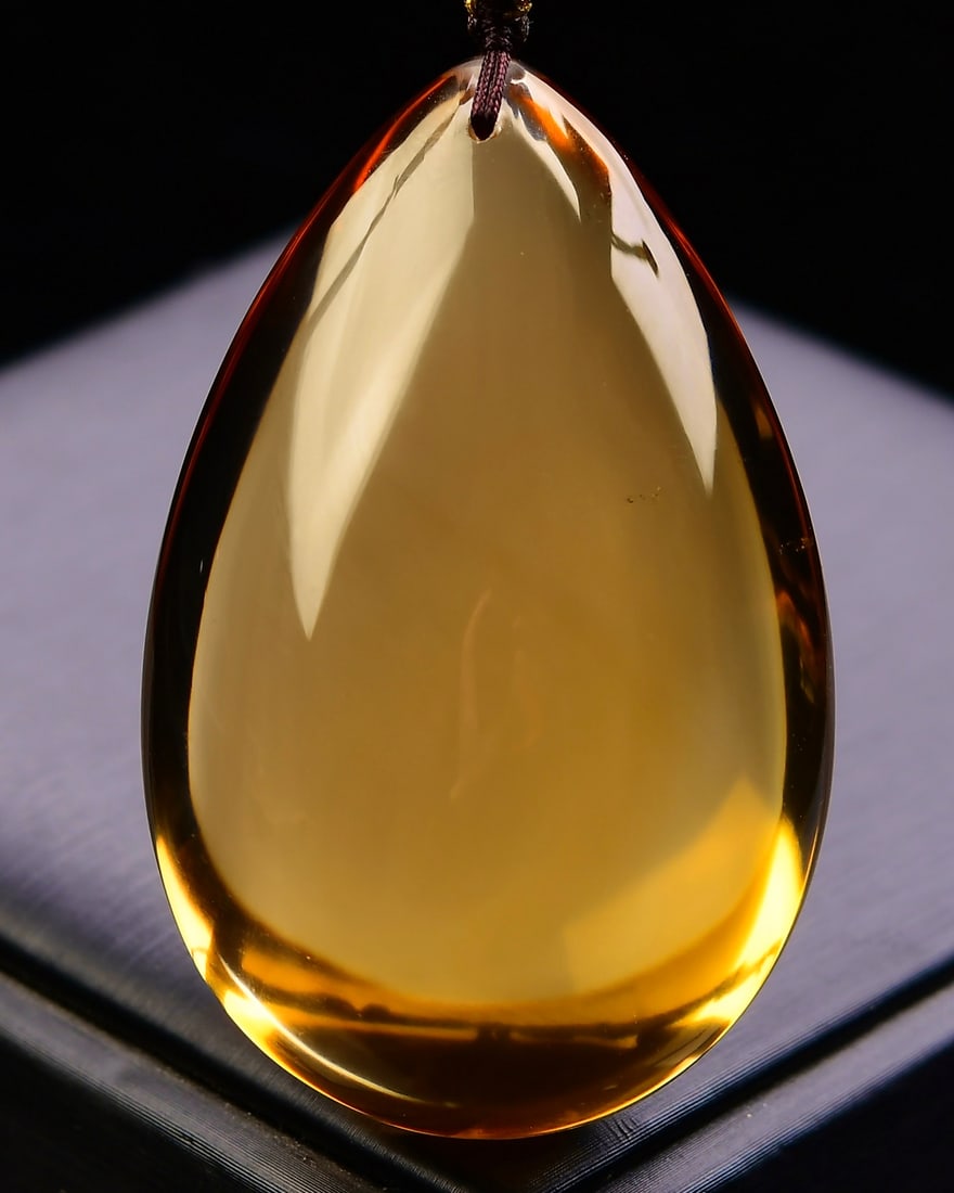 Natural Citrine Water-drop Pendant: Title: Natural Citrine Water-drop Pendant Origin: Chinese Date/Period: After2026 Materials: Citrine Dimensions: 60x39x23(mm) 2.36x1.54x0.91(inches) Weight 0.16 lbs/70.8g Reserve: $899.00 Shipping:
