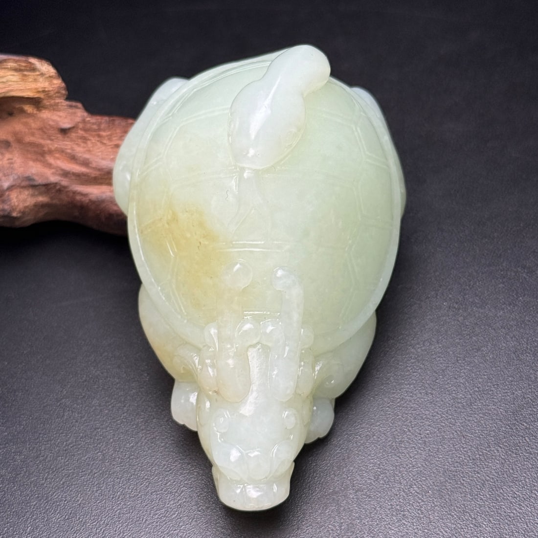 Hetian Jade Hand Carved Dragon Turtle Statue: Title: Hetian Jade Hand Carved Dragon Turtle Statue Origin: Chinese Date/Period: After2000 Materials: Hetian Jade Dimensions: 83x55x45(mm) 3.27x2.17x1.77(inches) Weight 0.47 lbs/215g Reserve: $799.00 
