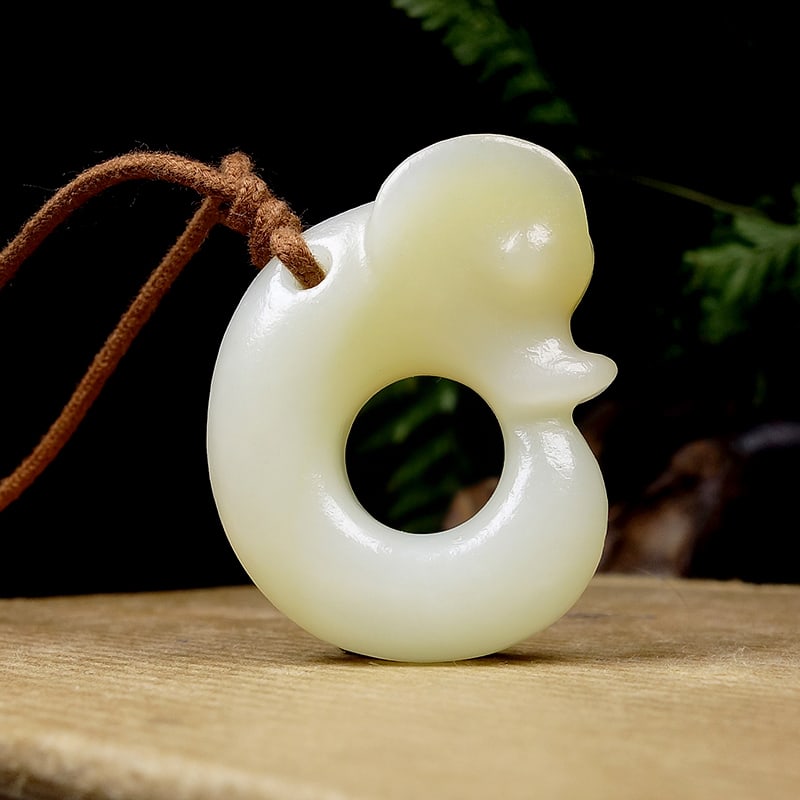 Hetian Jade Pendant - Dragon: Title: Hetian Jade Pendant - Dragon Origin: Chinese Date/Period: After2020 Materials: Hetian Jade Dimensions: 40x32x11(mm) 1.57x1.26x0.43(inches) Weight 0.05 lbs/21.3g Reserve: $299.00 Shipping: Dome