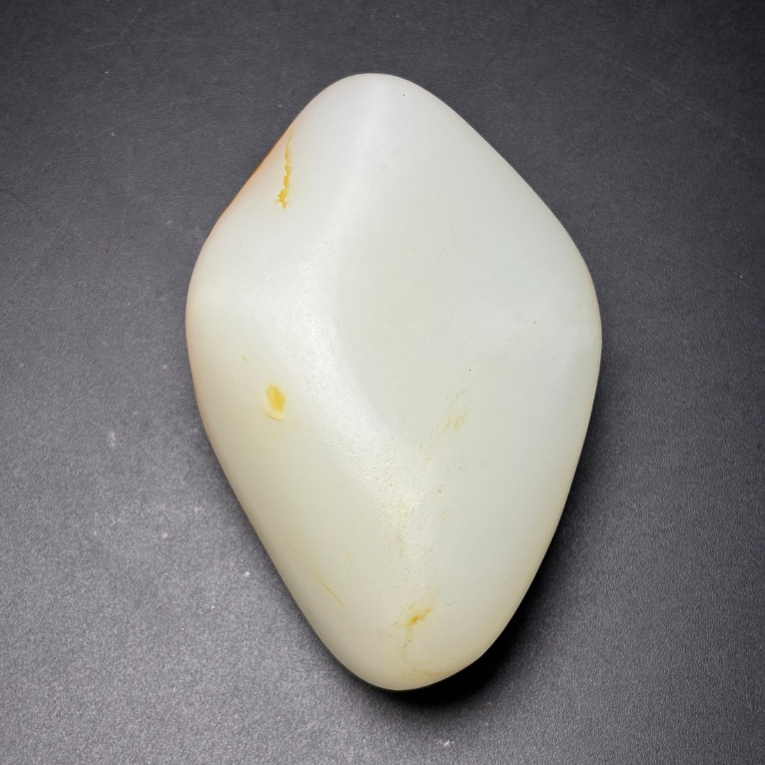 Natural Hetian Jade Original Stone Statue: Title: Natural Hetian Jade Original Stone Statue Origin: Chinese Date/Period: After2000 Materials: Hetian Jade Dimensions: 93x61x30(mm) 3.66x2.40x1.18(inches) Weight 0.55 lbs/249g Reserve: $2,999.00