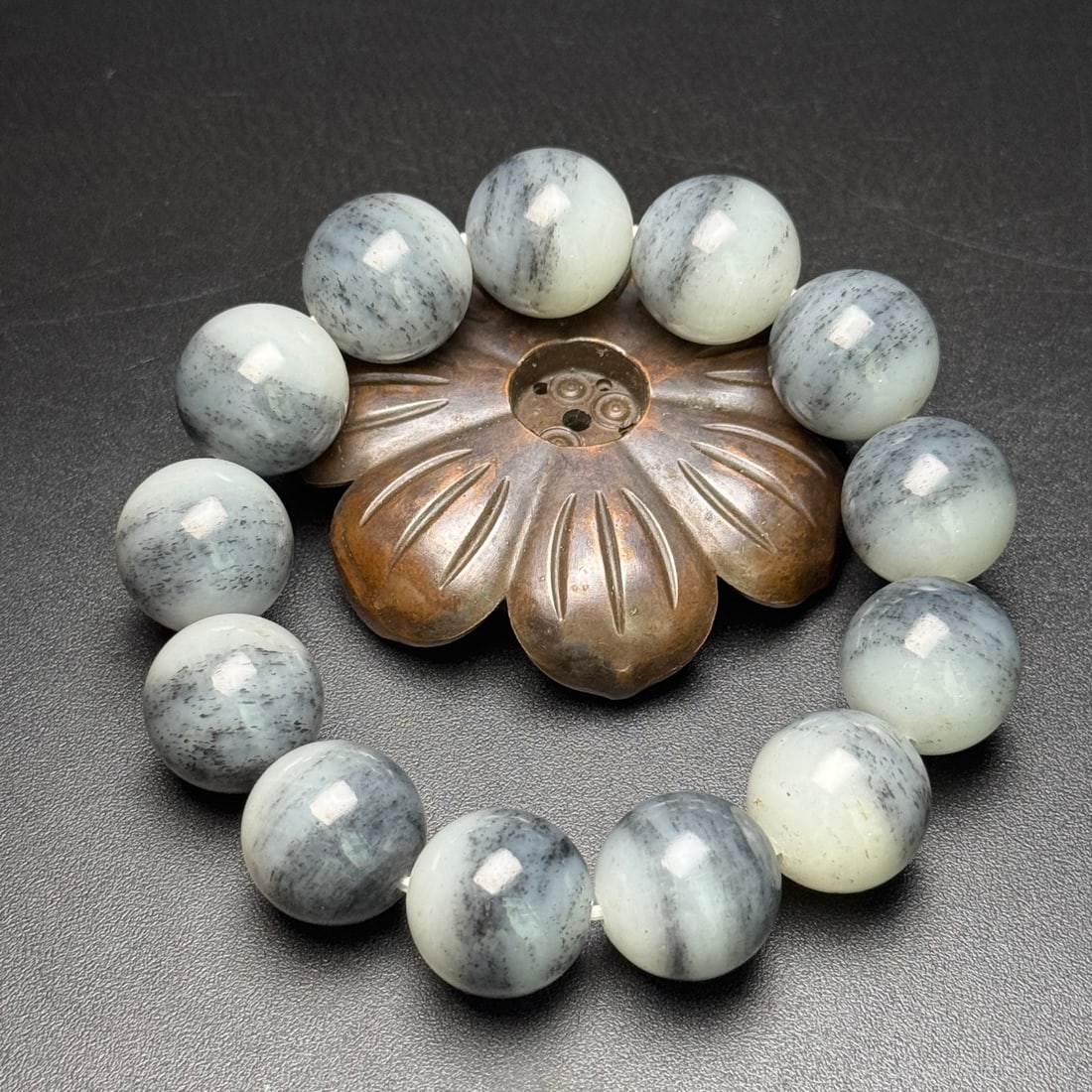 18mm Hetian Jade Beads Bracelet Bangle: Title: 18mm Hetian Jade Beads Bracelet Bangle Origin: Chinese Date/Period: After2000 Materials: Hetian Jade Dimensions: 18(mm) 0.71(inches) Weight 0.26 lbs/116g Reserve: $1,388.00 Shipping: Domestic:
