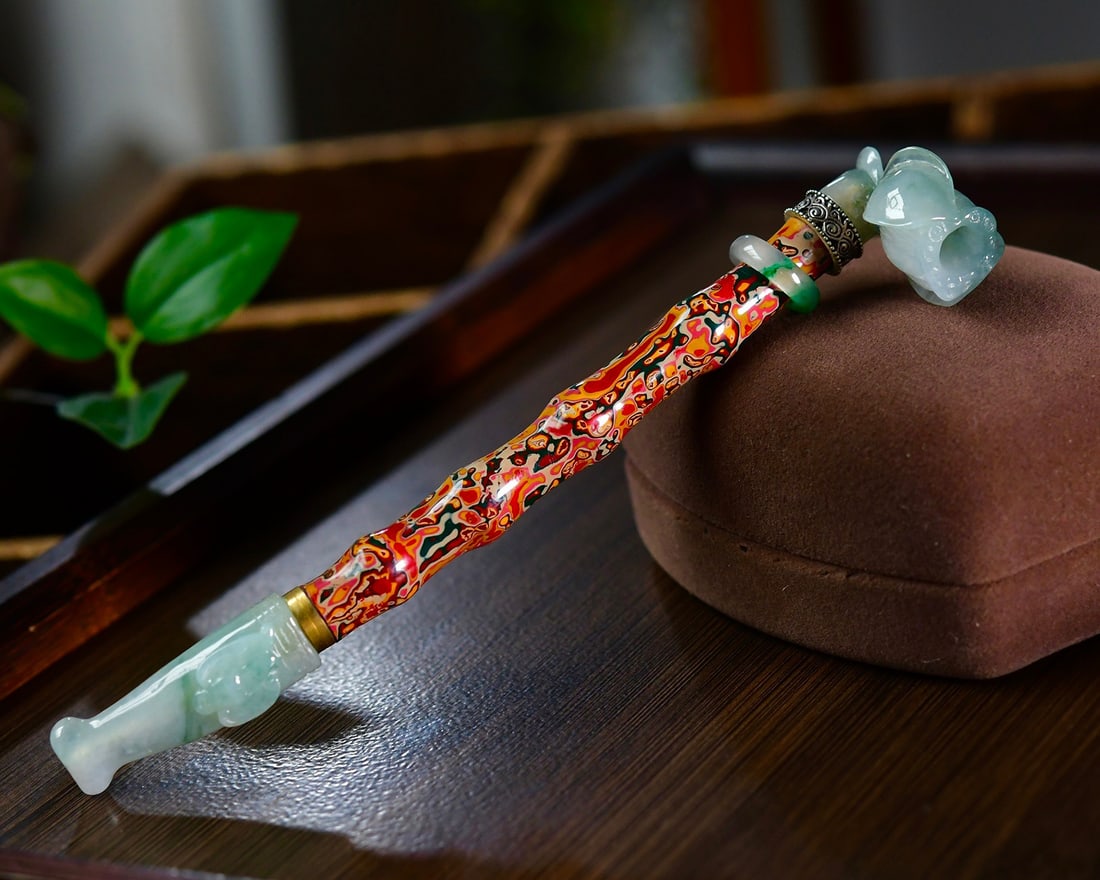 Jadeite Inlay Lacquerware Tobacco Pipe: Title: Jadeite Inlay Lacquerware Tobacco Pipe Origin: Chinese Date/Period: After2020 Materials: Jadeite,Lacquerware Dimensions: 32x22x14(mm) 1.26x0.87x0.55(inches) Length:155mm Reserve: $1,199.00 Ship
