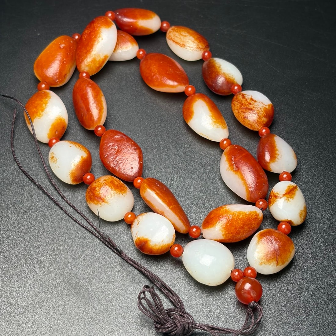 Hetian Jade Original Stone Necklace: Title: Hetian Jade Original Stone Necklace Origin: Chinese Date/Period: After2000 Materials: Hetian Jade Dimensions: 27x17x12(mm) 1.06x0.67x0.47(inches) Weight 0.37 lbs/166g Reserve: $1,388.00 Shippin