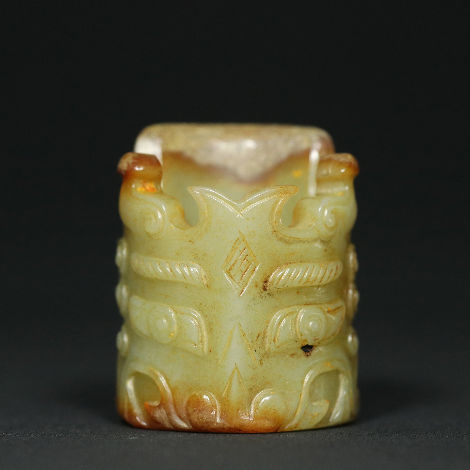 Inside Diameter 23mm Hetian Jade Dragon Thumb Ring: Title: Inside Diameter 23mm Hetian Jade Dragon Thumb Ring Origin: Chinese Date/Period: After1900 Materials: Hetian Jade Dimensions: 23x42x35(mm) 0.91x1.65x1.38(inches) Weight 0.10 lbs/47.6g Reserve: $