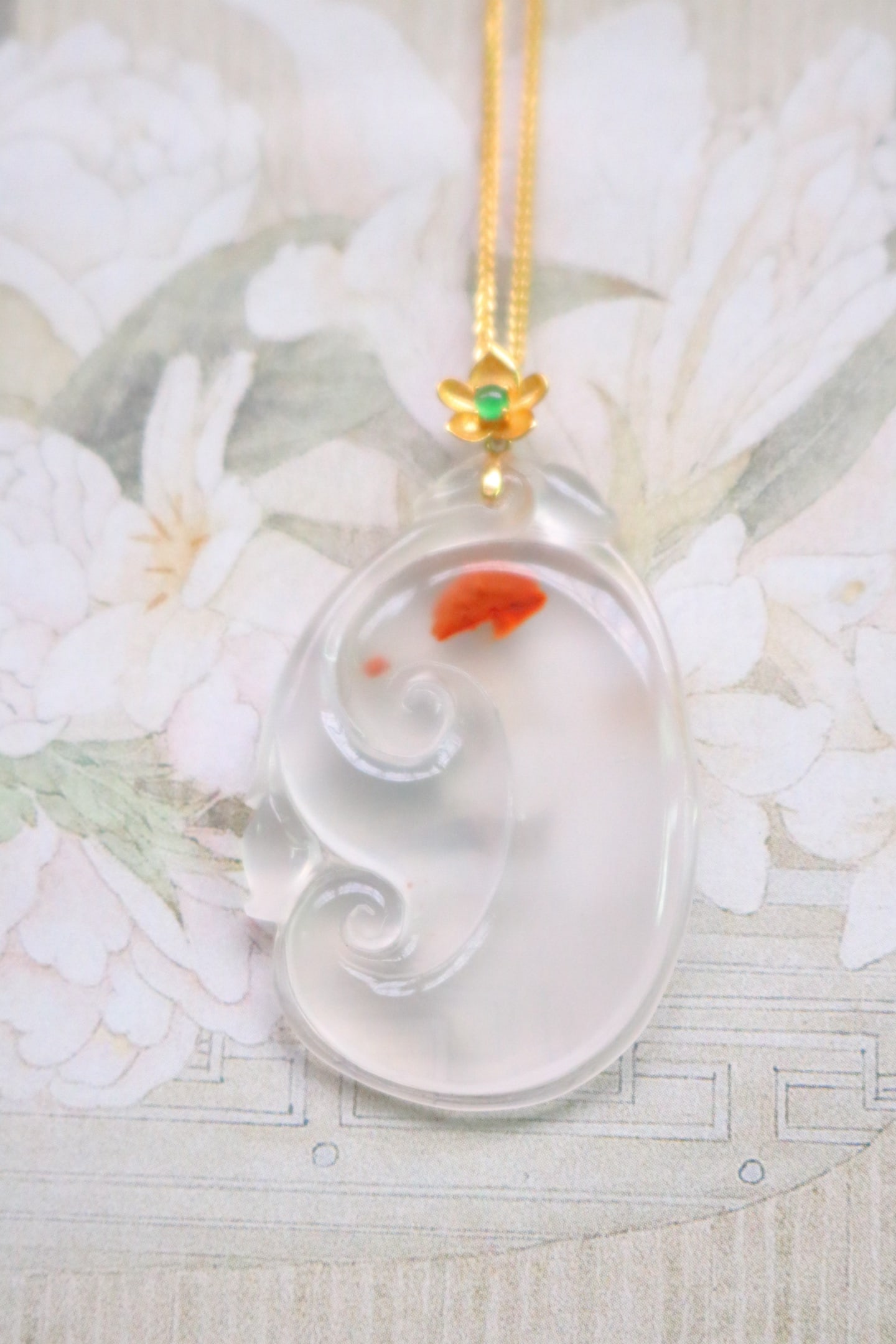 Nanhong Agate Ruyi Pendant: Title: Nanhong Agate Ruyi Pendant Origin: Chinese Date/Period: After2025 Materials: Nanhong Agate Dimensions: 43.5x25x4(mm) 1.71x0.98x0.16(inches) Reserve: $259.00 Shipping: Domestic: Shipping rates