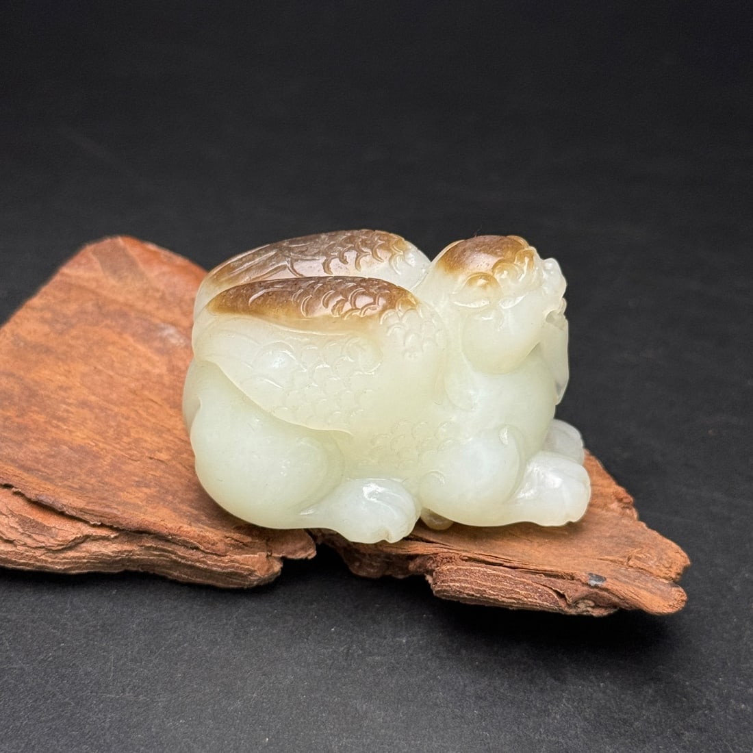 Hetian Jade Pixiu Pendant: Title: Hetian Jade Pixiu Pendant Origin: Chinese Date/Period: After2000 Materials: Hetian Jade Dimensions: 49x34x27(mm) 1.93x1.34x1.06(inches) Weight 0.14 lbs/65g Reserve: $599.00 Shipping: Domestic:
