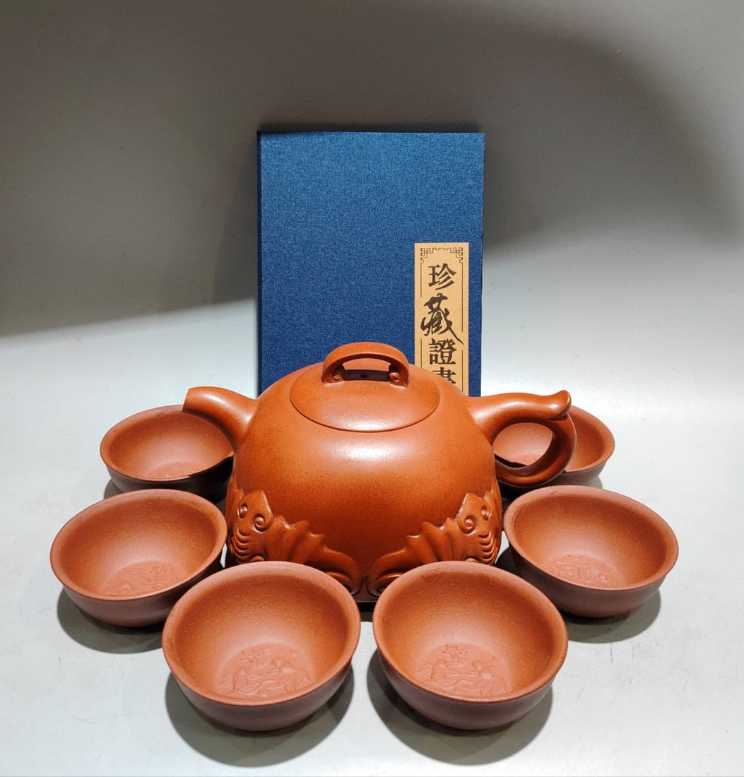 A Set Yixing Zisha Clay Fortune Bat Teapot & Cup w Artist Signed: Title: A Set Yixing Zisha Clay Fortune Bat Teapot & Cup w Artist Signed Origin: Chinese Date/Period: Materials: Yixing Zisha Dimensions: 180x100(mm) 7.09x3.94(inches) Reserve: $499.00 Shipping: Domes