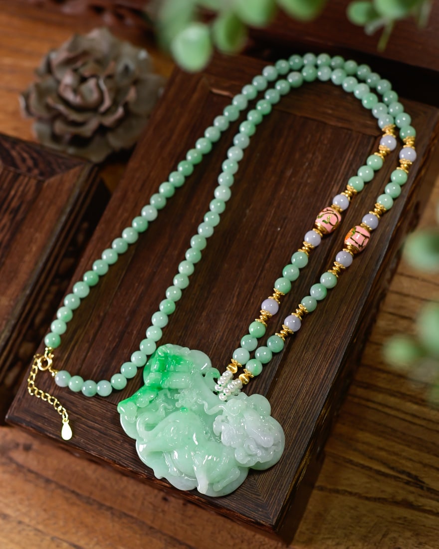 Green Jadeite Hand Carved Kylin Pendant & Necklace with Certificate: Title: Green Jadeite Hand Carved Kylin Pendant & Necklace with Certificate Origin: Chinese Date/Period: After2025 Materials: Green Jadeite Dimensions: 59x43x10(mm) 2.32x1.69x0.39(inches) Reserve: $3,9