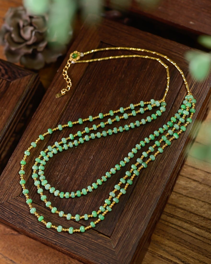 Silver & Green Jadeite Three layers Necklace with Certificate: Title: Silver & Green Jadeite Three layers Necklace with Certificate Origin: Chinese Date/Period: After2026 Materials: Silver & Green Jadeite Dimensions: 4(mm) 0.16(inches) Reserve: $399.00 Shipping: