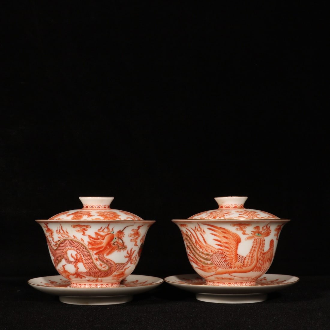 A Pair Iron Red Glaze Dragon Phoenix Design Porcelain Teabowl: Title: A Pair Iron Red Glaze Dragon Phoenix Design Porcelain Teabowl Origin: Chinese Date/Period: After1880 Materials: Porcelain Dimensions: 110x90(mm) 4.33x3.54(inches) Reserve: $599.00 Shipping: Do