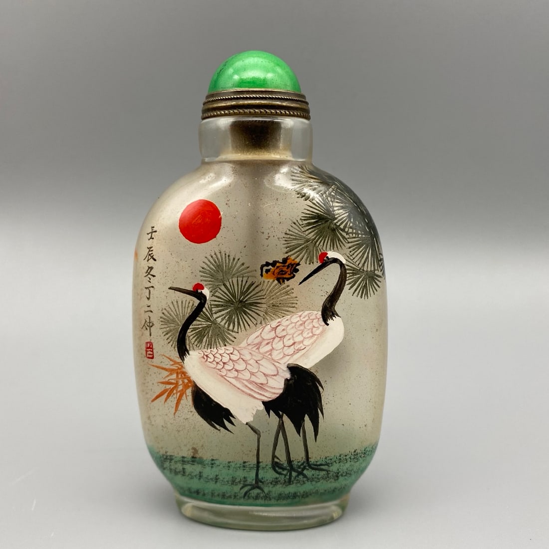 Old Peking Glass Inside Painting Crane Snuff Bottle: Title: Old Peking Glass Inside Painting Crane Snuff Bottle Origin: Chinese Date/Period: After1900 Materials: Peking Glass Dimensions: 90x50x28(mm) 3.54x1.97x1.10(inches) Weight 0.16 lbs/71g Reserve: $