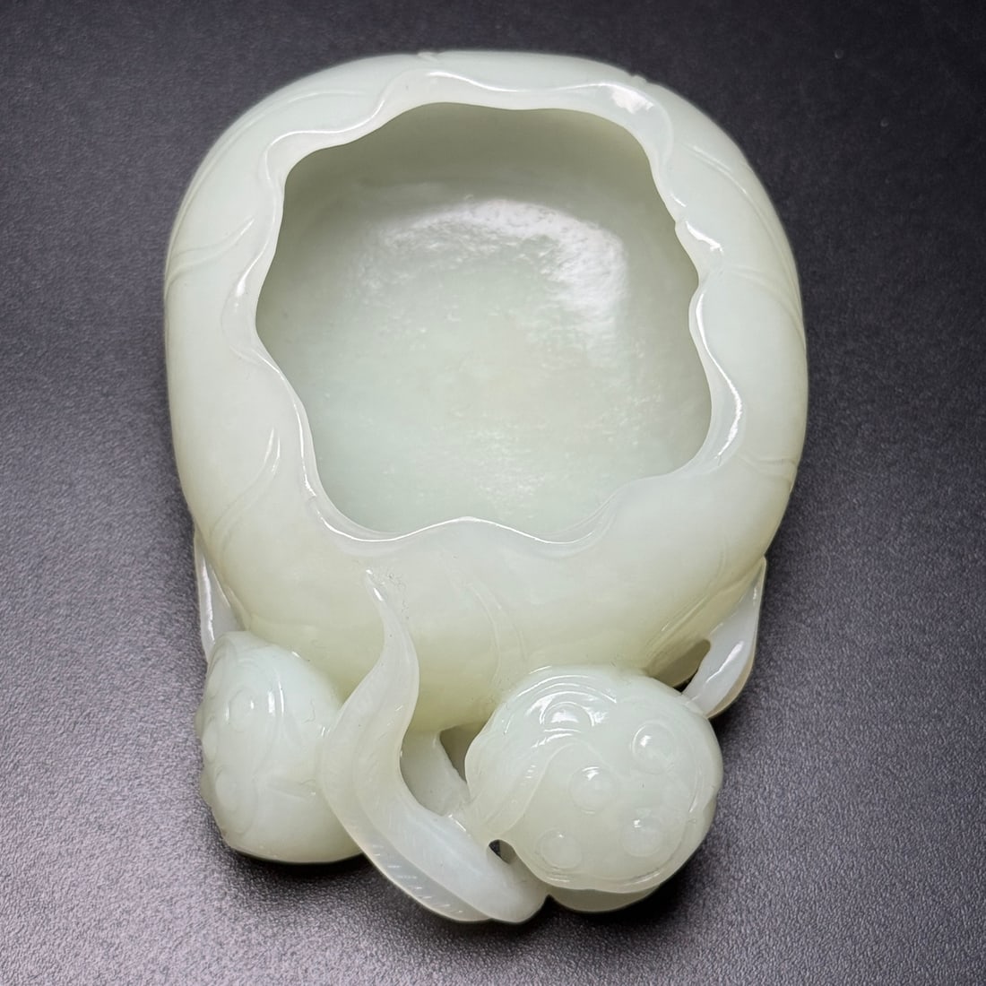 Hetian Jade Hand Carved Lotus Brush Washer: Title: Hetian Jade Hand Carved Lotus Brush Washer Origin: Chinese Date/Period: After1900 Materials: Hetian Jade Dimensions: 100x71x36(mm) 3.94x2.80x1.42(inches) Weight 0.53 lbs/240g Reserve: $1,999.00