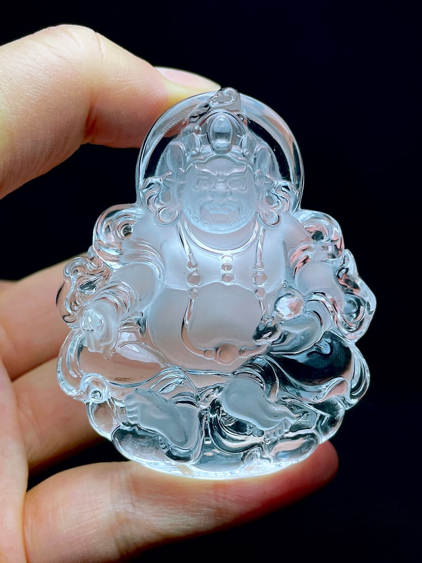 White Crystal Hand Carved Yellow Jambhala Pendant with Certificate: Title: White Crystal Hand Carved Yellow Jambhala Pendant with Certificate Origin: Chinese Date/Period: After2020 Materials: White Crystal Dimensions: 66x55x14(mm) 2.60x2.17x0.55(inches) Weight 0.14 lb