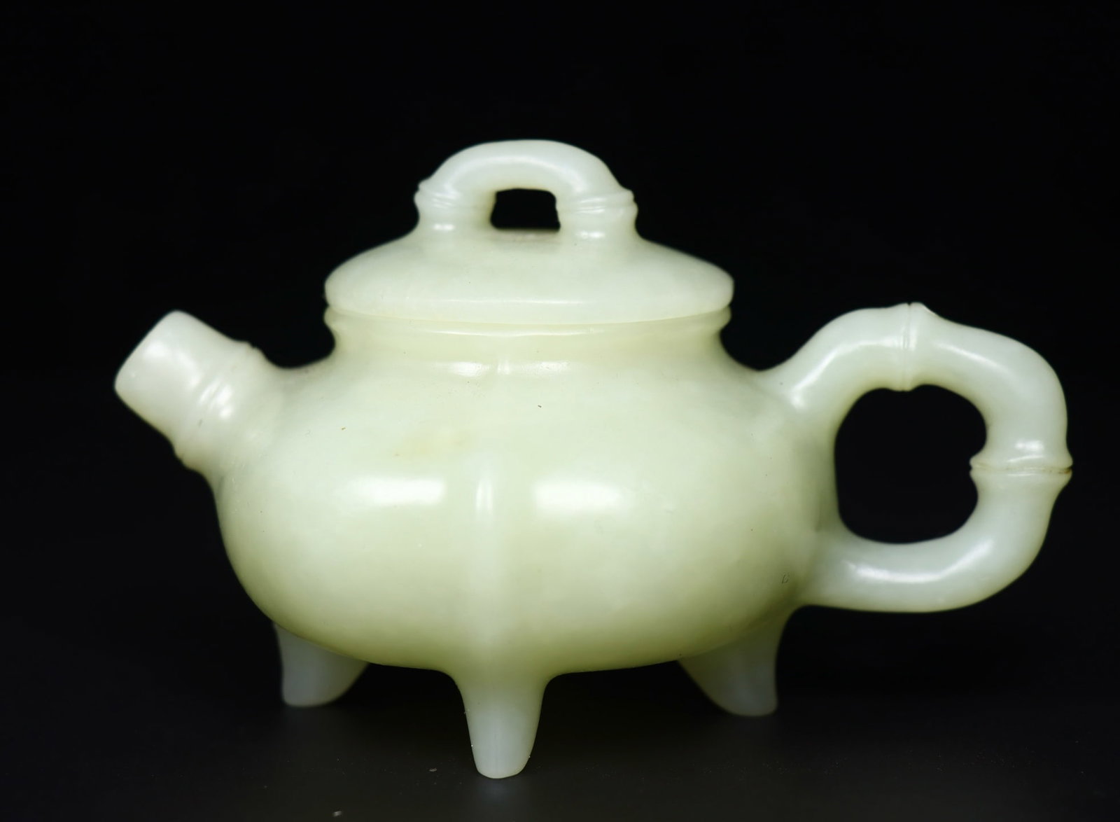 Old Hetian Jade Teapot: Title: Old Hetian Jade Teapot Origin: Chinese Date/Period: After1900 Materials: Hetian Jade Dimensions: 120x98x73(mm) 4.72x3.86x2.87(inches) Weight 0.60 lbs/273g Reserve: $2,399.00 Shipping: