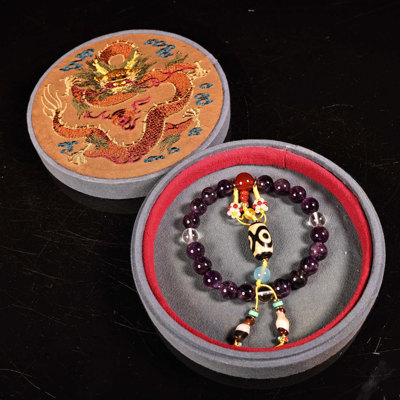 Old Amethyst DZI Agate Hand Chain w Box: Title: Old Amethyst DZI Agate Hand Chain w Box Origin: Chinese Date/Period: After1900 Materials: Amethyst_DZI Agate Dimensions: 12(mm) 0.47(inches) Weight 0.15 lbs/70g Reserve: $280.00 Shipping: