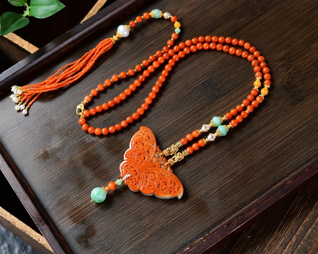 Red Jadeite Hand Carved Butterfly Pendant Necklace: Title: Red Jadeite Hand Carved Butterfly Pendant Necklace Origin: Chinese Date/Period: After2026 Materials: Jadeite Dimensions: 67x32x8(mm) 2.64x1.26x0.31(inches) Reserve: $699.00 Shipping: Domestic: