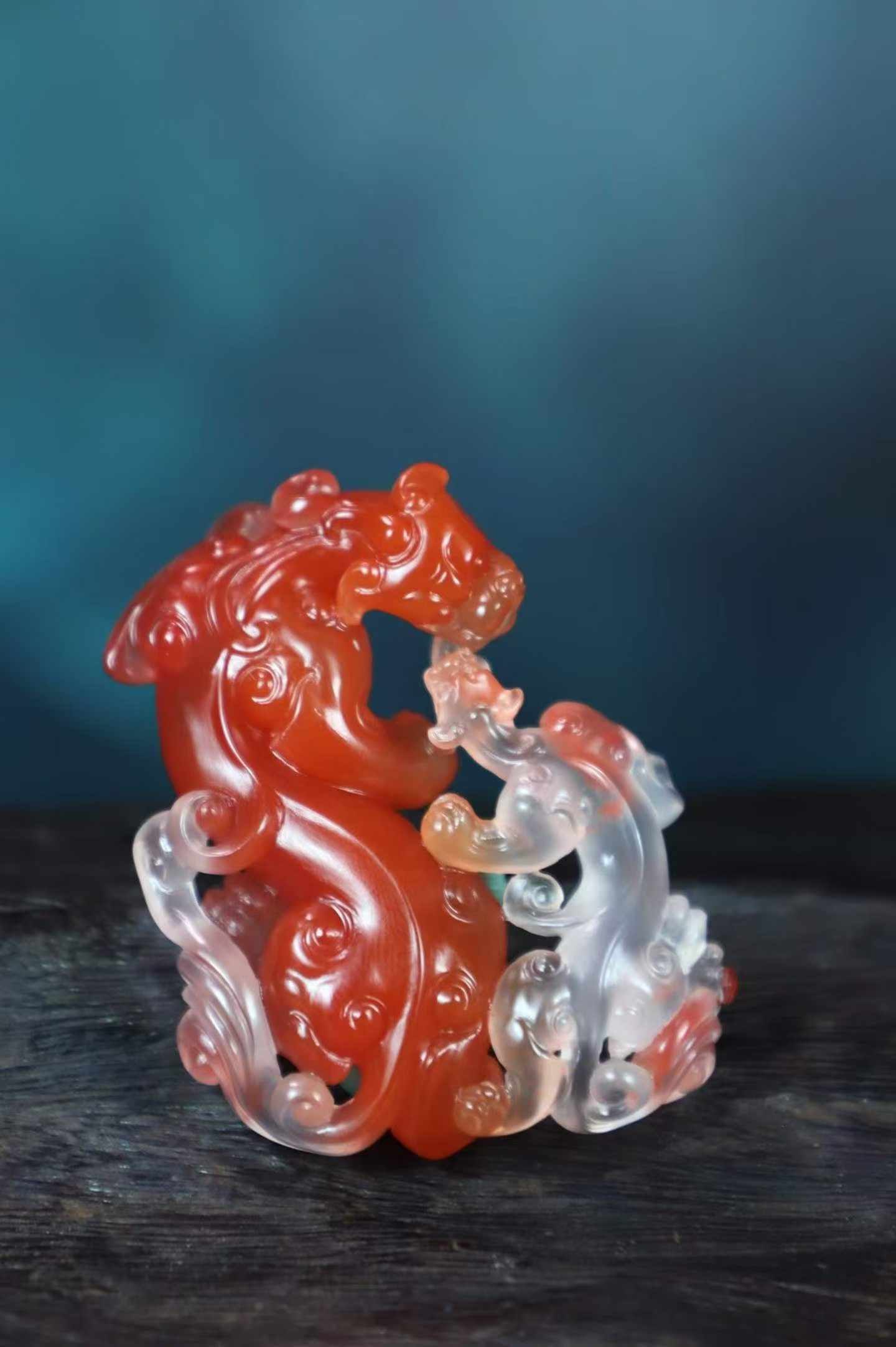 Nanhong Agate Pendant - Chi Dragon with Certificate: Title: Nanhong Agate Pendant - Chi Dragon with Certificate Origin: Chinese Date/Period: After2026 Materials: Nanhong Agate Dimensions: 40.2x54x11(mm) 1.58x2.13x0.43(inches) Weight 0.06 lbs/25g Reserve
