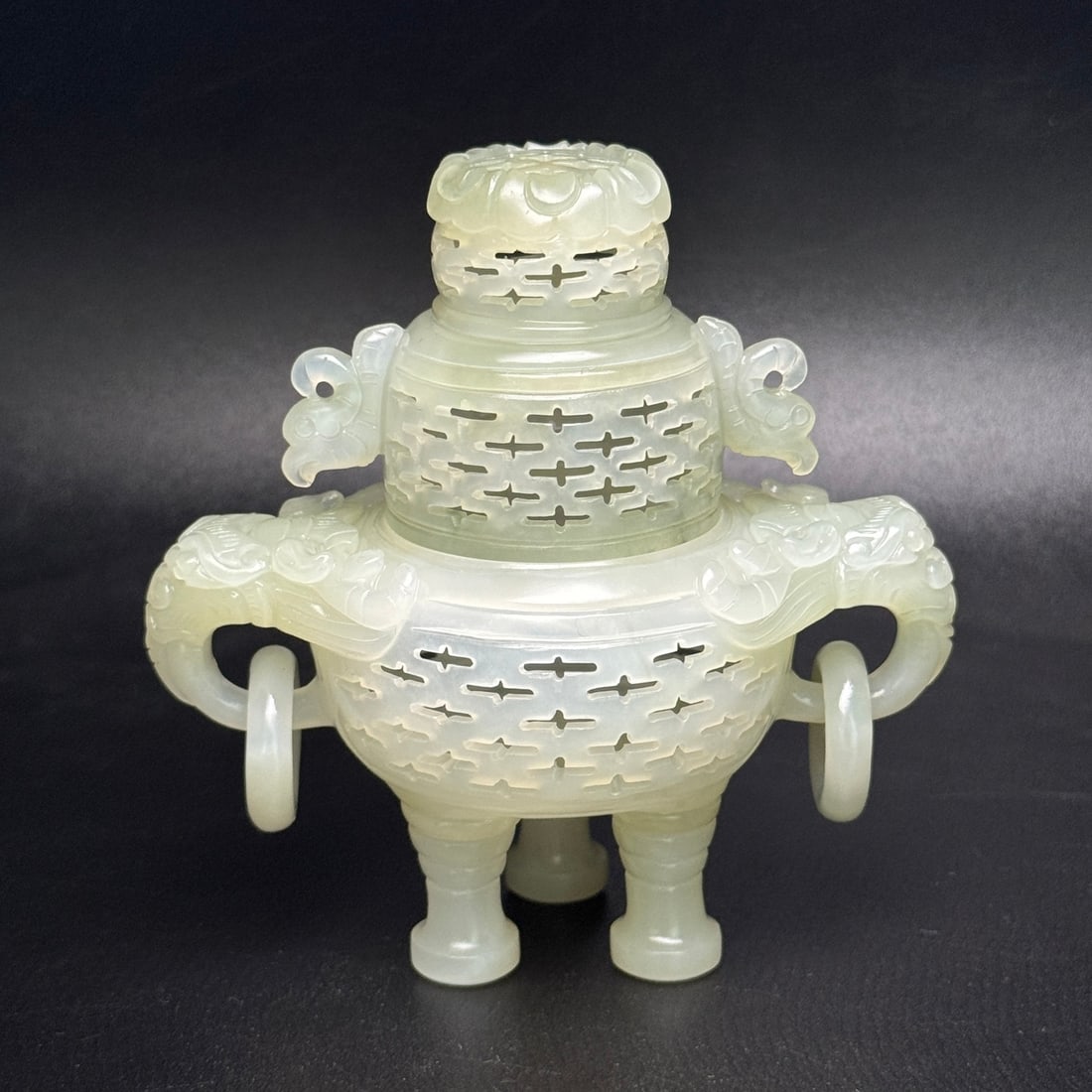 Openwork Hetian Jade Incense Burner: Title: Openwork Hetian Jade Incense Burner Origin: Chinese Date/Period: After2000 Materials: Hetian Jade Dimensions: 92x94x54(mm) 3.62x3.70x2.13(inches) Weight 0.28 lbs/125g Reserve: $1,999.00 Shippin
