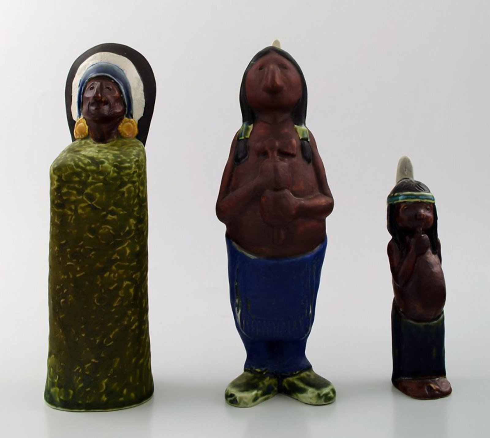 Rolf Palm, Hoganas, three Indians, unique ceramic figures.: Title: Rolf Palm, Hoganas, three Indians, unique ceramic figures. Description: Rolf Palm, Hoganas, three Indians, unique ceramic figures. Swedish design. 1950s. Measuring: 21.5 cm. (highest) Stamped. 
