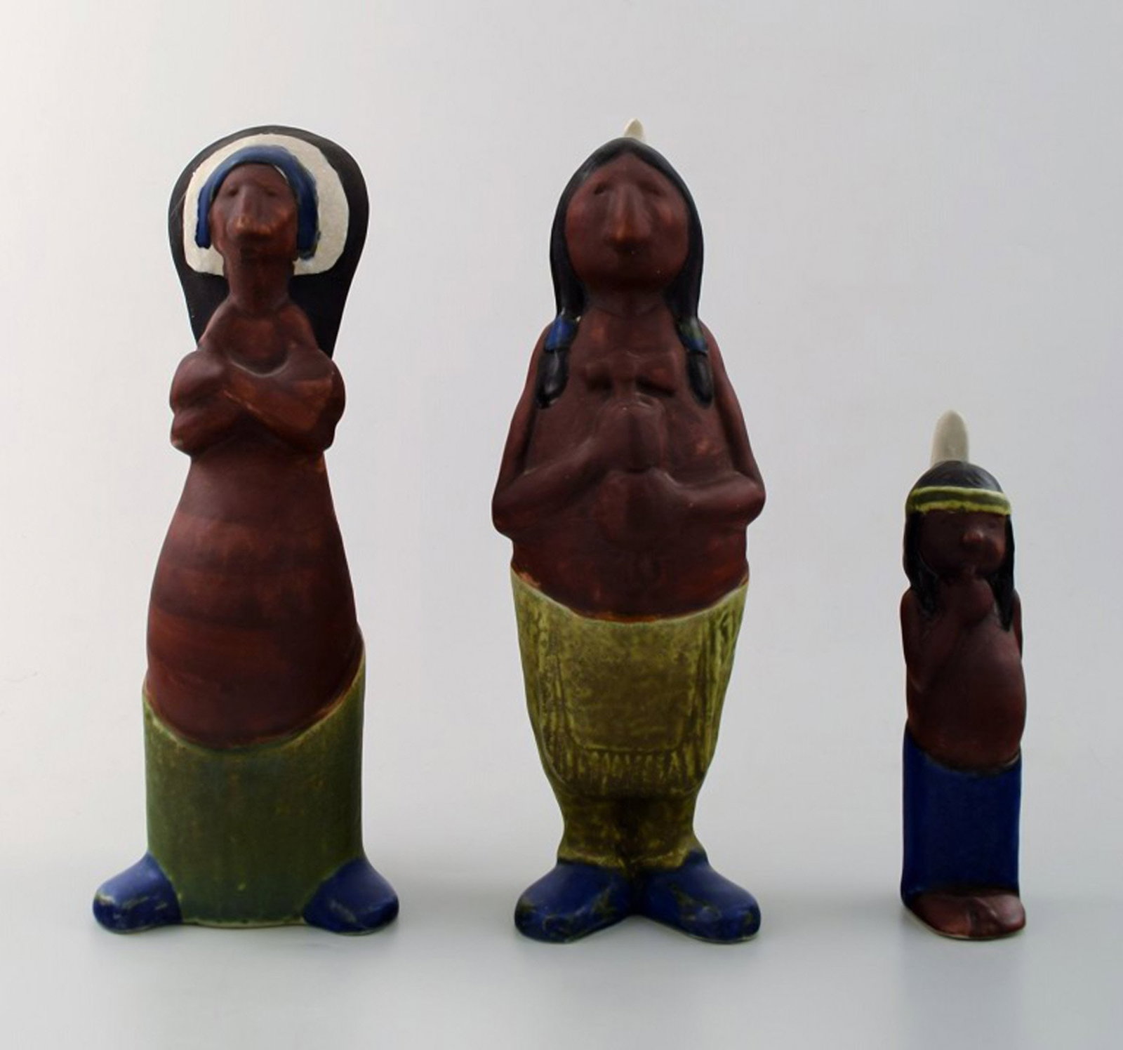 Rolf Palm, Hoganas, three Indians, unique ceramic figures.: Title: Rolf Palm, Hoganas, three Indians, unique ceramic figures. Description: Rolf Palm, Hoganas, three Indians, unique ceramic figures. Swedish design. 1950s. Measuring: 21.5 cm. (highest) Stamped. 