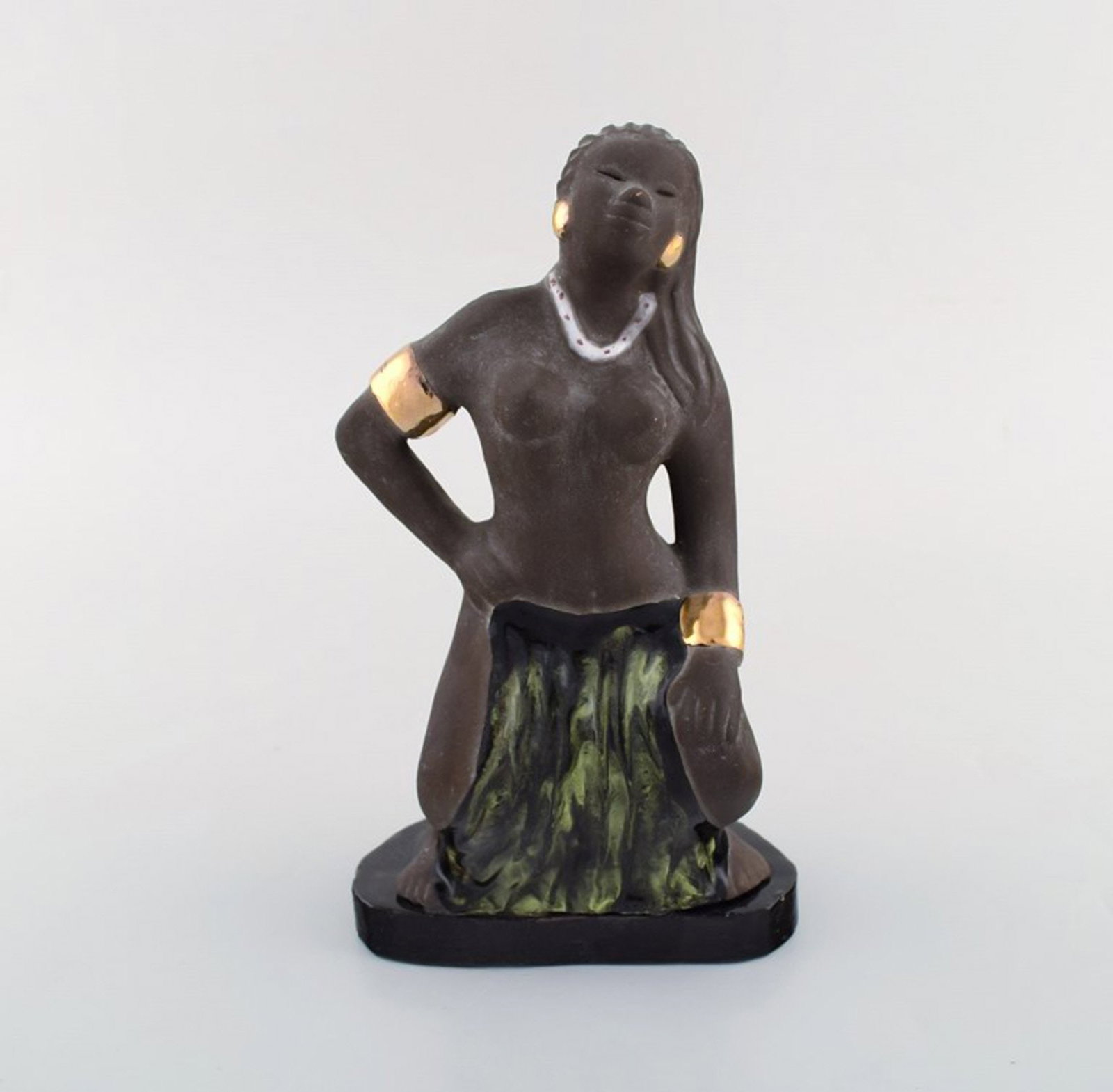 Bengt Wall, Sweden. Balinese girl in raw and glazed ceramics with gold decoration. 1950's.: Title: Bengt Wall, Sweden. Balinese girl in raw and glazed ceramics with gold decoration. 1950's. Description: Bengt Wall, Sweden. Balinese girl in raw and glazed ceramics with gold decoration.